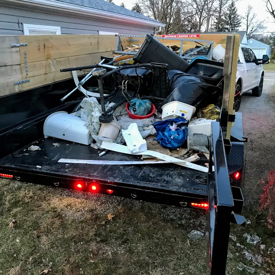 Roll-off dumpster delivered to a residential driveway in Montrose
