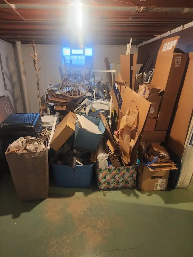 Roll-off dumpster container at job site for 6 Yard Dumpster Rental in Montrose